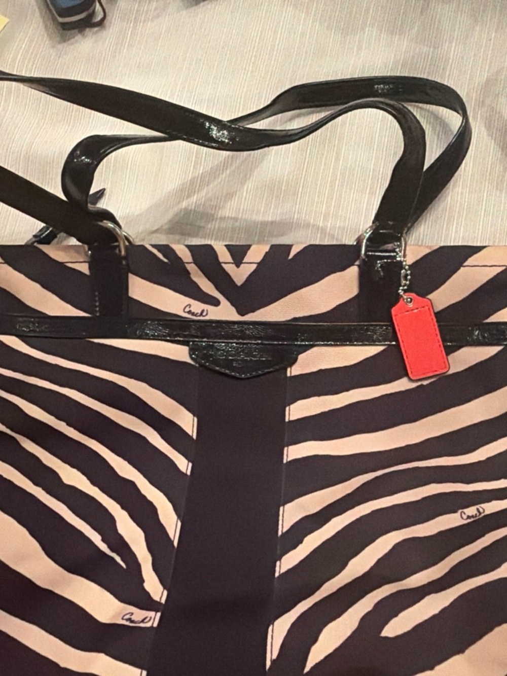 Coach Black and Cream Zebra-Print Tote with Coral Tag